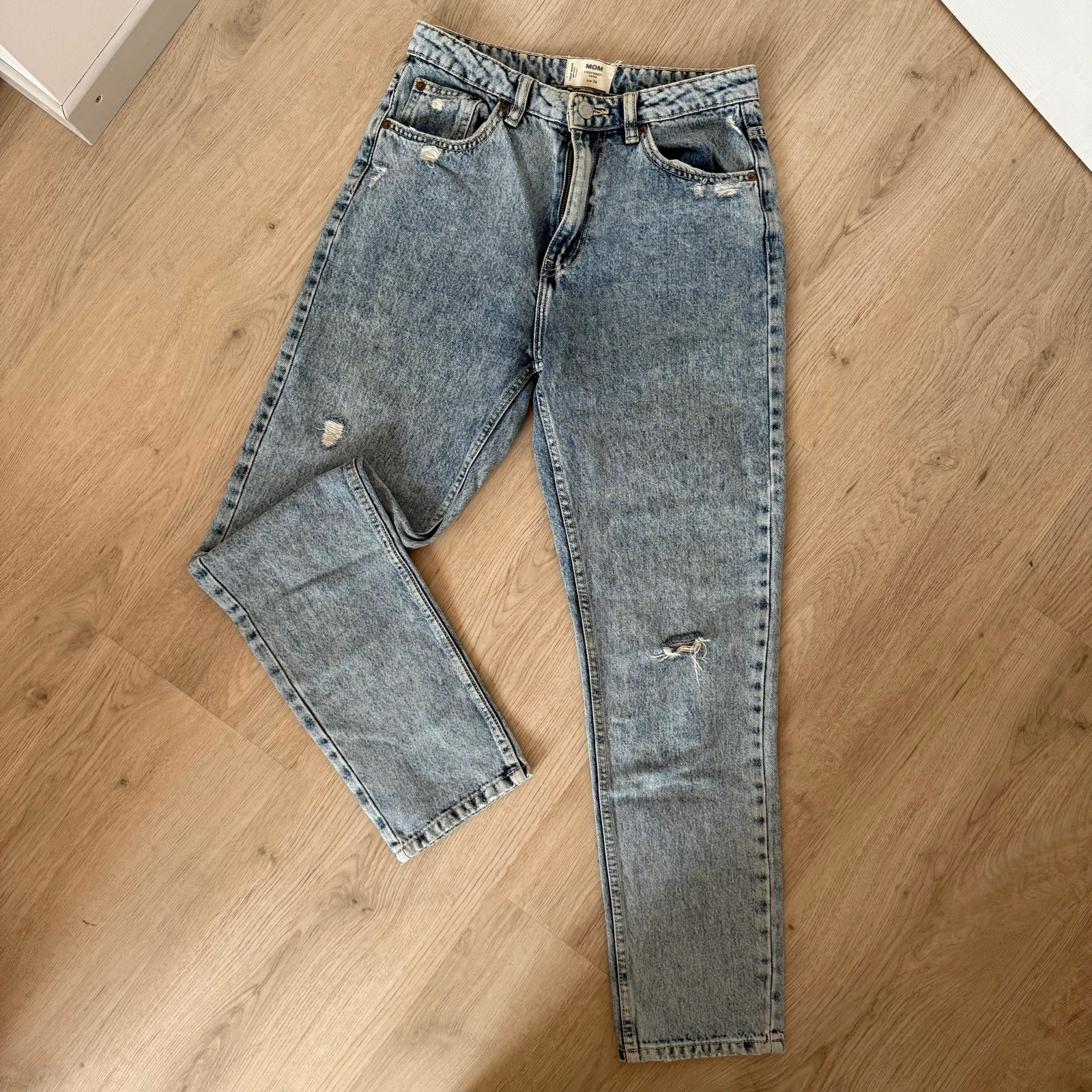 Jean Mom taille haute bleu délavé 